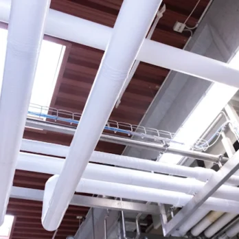 Piping in dairy insulated with Dan-isoCLEAN pipe insulation EC-ISO from Dan-iso