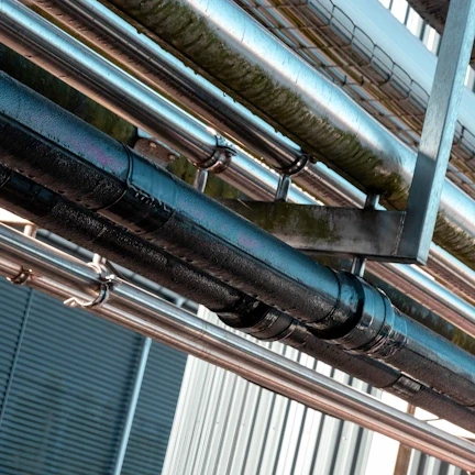 Piping in dairy insulated with UV-protective Dan-isoUV pipe insulation