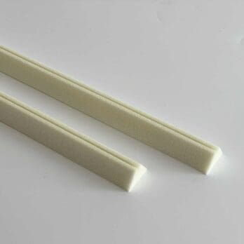 Polyurethane alarm wire holders for securing alarm wire under foam insulation of pipes.
