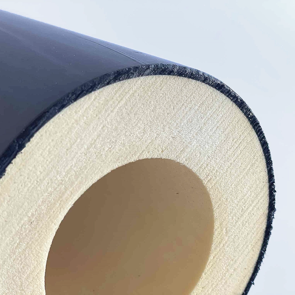 Cylindrical insulation component with PE Polyethylene and light inner surface, used for industrial constructions.